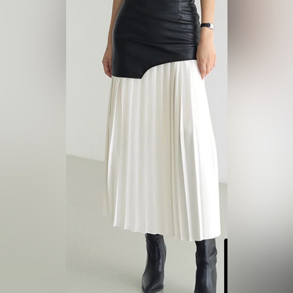 Elegant White Pleated Skirt with Faux Leather Asymmetrical Accent